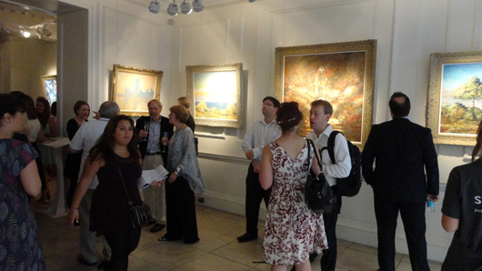 Castle Fine Art welcomed record crowds to the opening night of the John Myatt ‘Genuine Fakes’ exhibition on July 17. Image Auction Central News.